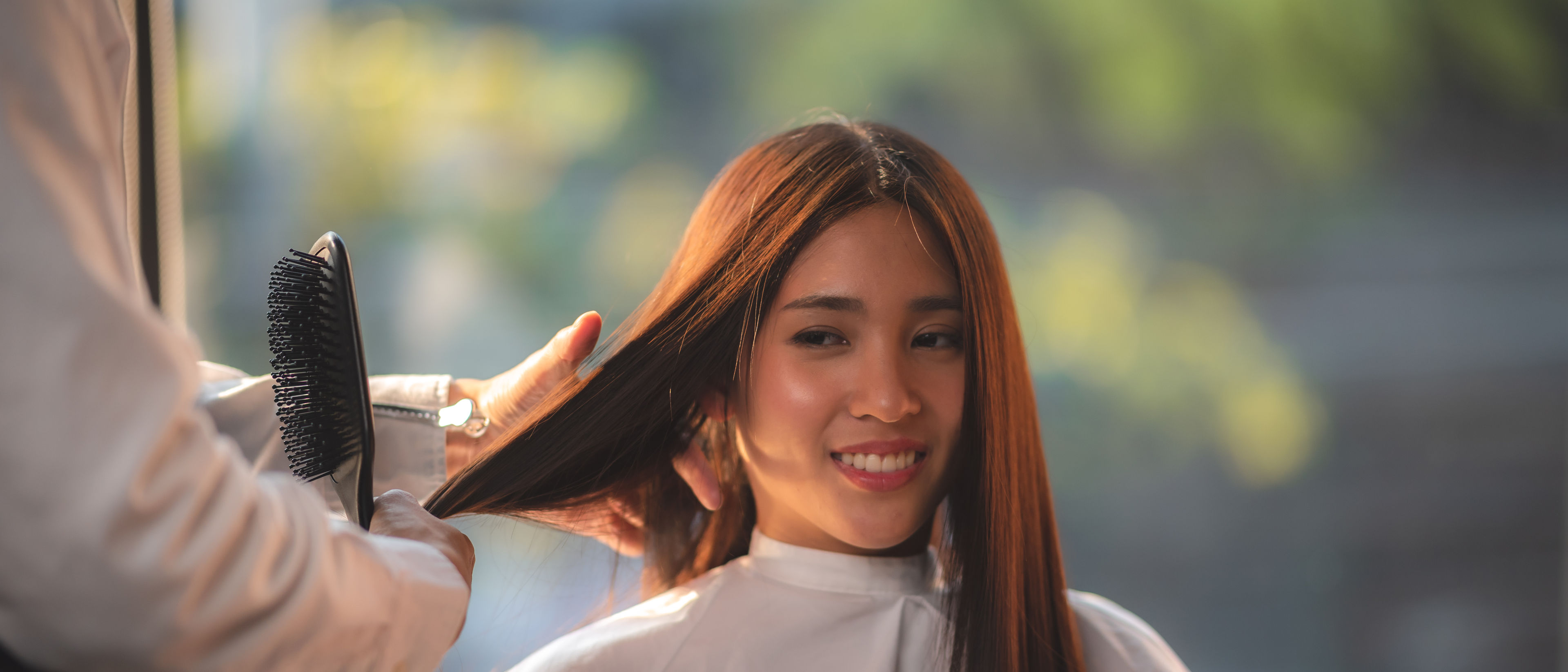 Woman doing hair care.